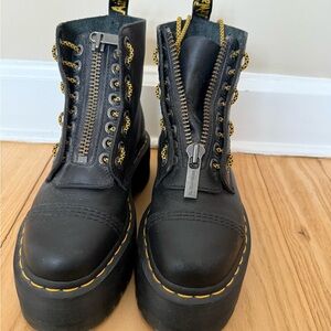 Dr. Martens Black Leather Combat Boots with Yellow Stitching